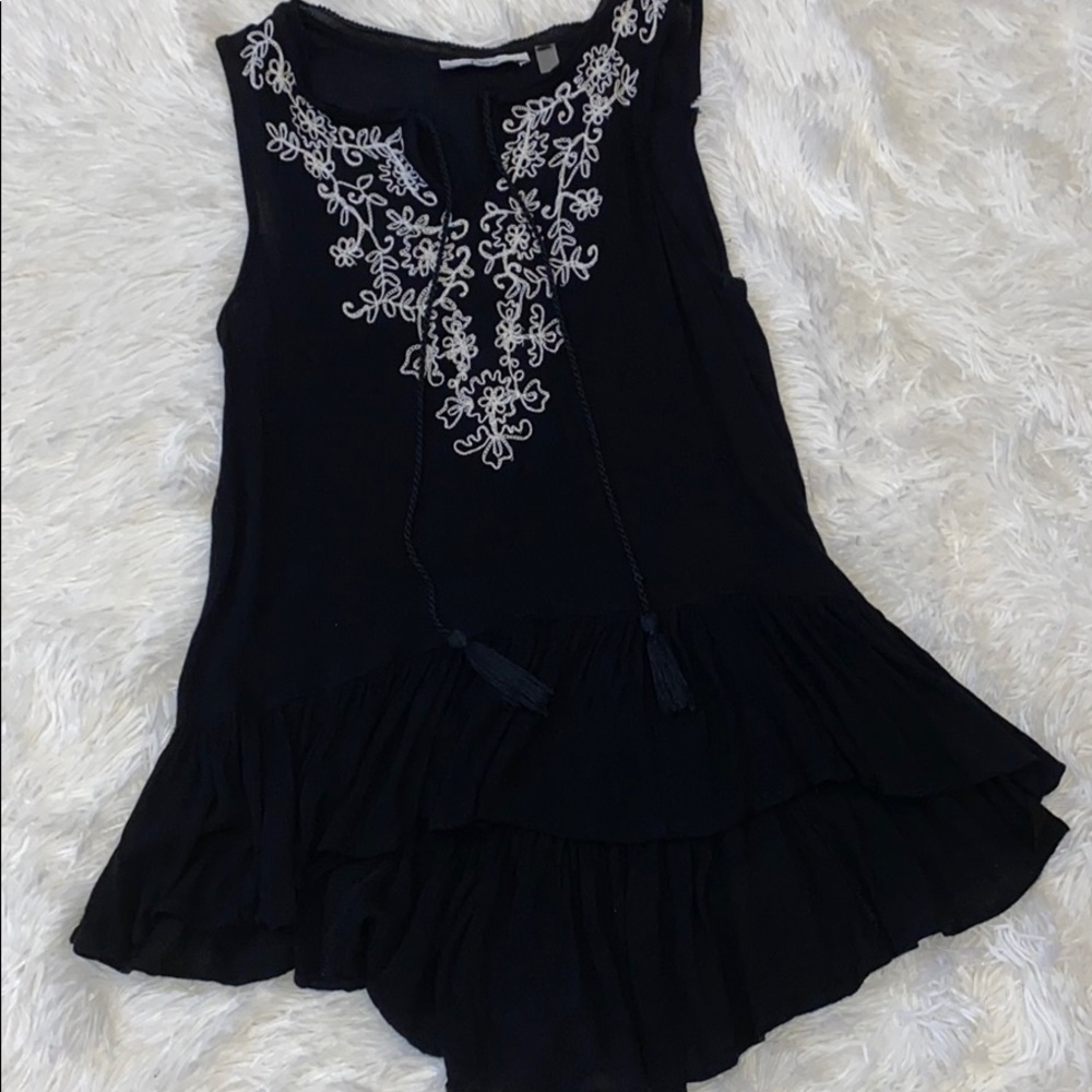 Black blouse with white floral detail